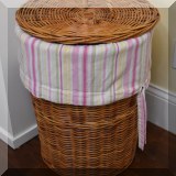 D86. Wicker hamper 23”h x 16”w - $24 